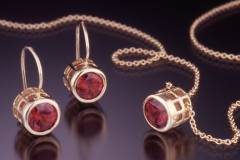 Caged facet rhodolite