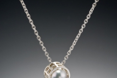 Mesh silver caged pearl pendant
